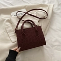Burgundy leopard print crossbody bag with dual top handles and adjustable strap - Red