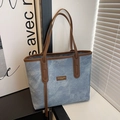 Large capacity denim blue tote bag with brown leather handles for casual commuting - Blue
