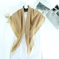 Elegant camel cotton linen scarf with gold silk threads shown on a hanger display - Khaki