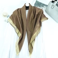 Sparkly brown gold glitter scarf with metallic border over a white shirt - Coffee