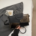 Borsa chic in pelle litchi nera e pitonata marrone con manico in metallo argento - Marrone
