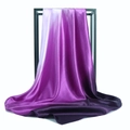 Close-up of a purple gradient satin scarf hanging elegantly on a minimalist black frame - 90x90cm / Rose Purple Gradient