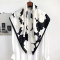 Elegant black and white floral print silk scarf styled over a white shirt for women - Botanical Print Style / Black and White Pattern