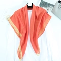 Elegant coral red cotton linen scarf with gold metallic thread and fringe detail - Orange Red