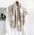 Elegant grey floral twill silk scarf draped on a white shirt for a stylish look - Elegant Floral Style / Khaki Floral
