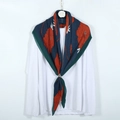 Pleated navy blue scarf with large orange floral print and stylish golden ring buckle - Peacock Blue Edge