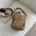 Khaki crossbody phone bag in textured nylon with adjustable strap and metal logo - Khaki