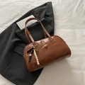 Brown faux leather bowling bag with wooden beads on a suit and book background - With Pendant / Brown