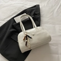Minimalist cream white bowling handbag with beaded tassel detail and smooth PU finish - With Pendant / White