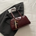 Retro burgundy PU leather shoulder bag with beaded charm and front flap pocket detail - With Pendant / Red