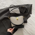 Contrast bucket bag in cream canvas and black leather with adjustable shoulder strap - Black