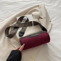 Burgundy suede cylinder crossbody bag with wide geometric pattern jacquard strap - Red