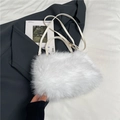 Plush white faux fur handbag with adjustable leather straps in a stylish lifestyle setting - Off White