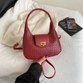 Dark red woven leather hobo bag with gold twist lock and adjustable shoulder strap - Red