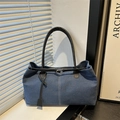 Minimalist navy denim tote bag with leather straps and stylish contrast stitching design - Blue