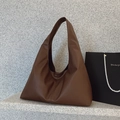Minimalist dark brown soft leather hobo tote bag in a spacious shoulder style - Brown