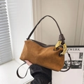 Caramel brown matte leather Boston bag with chunky gold chain detail and zip closure - Brown