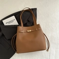 Classic brown leather tote bag with stylish belt buckle and side drawstring details - Brown