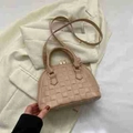 Beige embossed woven pattern handbag with golden metal clasp and crossbody strap - Khaki