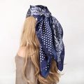 Navy blue satin headscarf with white polka dots and paisley patterns on a mannequin - Bandana / Paisley Dots Navy