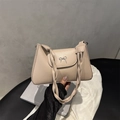 Sac seau beige à nœud avec poignée torsadée pour femme porté bandoulière - Kaki