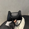 Sac seau noir tendance avec nœud argenté et bandoulière tressée pour femme - Noir
