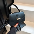 Minimalist black litchi grain small square bag with iconic golden T-shaped buckle - Black