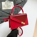 Red crossbody handbag with crocodile embossed flap and minimalist gold metal clasp - Red