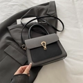 Chic black and grey mixed fabric small crossbody bag with a golden horseshoe buckle - Black