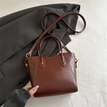 Brown leather bucket tote bag with gold hardware and removable shoulder strap - Dark Brown