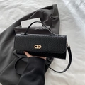 Woven black leather shoulder bag with gold CD buckle and detachable strap for women - Black