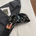Chic black pleated cloud clutch bag with gold studs and a glossy designer finish - Black