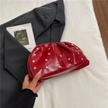 Dark red pleated leather clutch bag with golden rivets and trendy vintage style - Red
