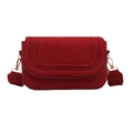 Red faux suede crossbody bag with rounded flap and golden metal clasp on white background - Suede Red