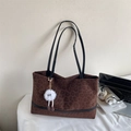 Brown leopard print tote bag with black handles and a white plush keychain accessory - With Pendant / Brown