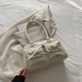 Cream PU ballet style shoulder bag featuring shiny finish and double bow pockets - White