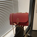 Minimalist red envelope crossbody bag with gold chain strap and oval metal buckle - Red