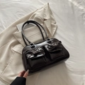 Deep brown glossy patent leather shoulder bag with chic bow details and double front pockets - Brown