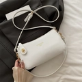 White litchi pattern crossbody pillow bag with gold hardware and adjustable strap - White