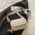 Minimalist beige saddle crossbody bag with wide fabric strap and golden hardware - Suede White
