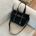Minimalist black woven texture tote bag with leather belt detail and adjustable strap - Black