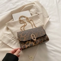 Stylish leopard print crossbody bag with gold chain strap and metallic clasp closure - Leopard Coffee