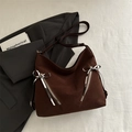 Dark brown Hobo tote bag with symmetric zippers and silver bow buckle detail - Brown