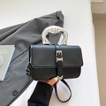 Chic black crossbody bag with silver metallic handle and pebble leather texture - Black