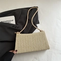 Minimalist beige woven baguette bag with fine texture on a black blazer background - Khaki (Without Charm)