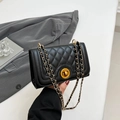 Classic black quilted shoulder bag with gold twist lock and chain strap for women - Black