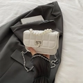 White quilted crossbody bag with pearl handle and silver chain strap in faux leather - White