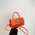 Orange faux crocodile leather handbag with rhinestone bow buckle and top handle - Orange