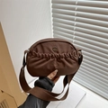 Deep brown ruched canvas crossbody bag with metal M logo and wide shoulder strap - Brown