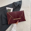 Elegant burgundy envelope clutch bag with snakeskin texture and gold metal trim detail - Red